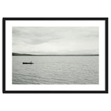 A boy pedaling the Board on the Lake - Iceland thumbnail
