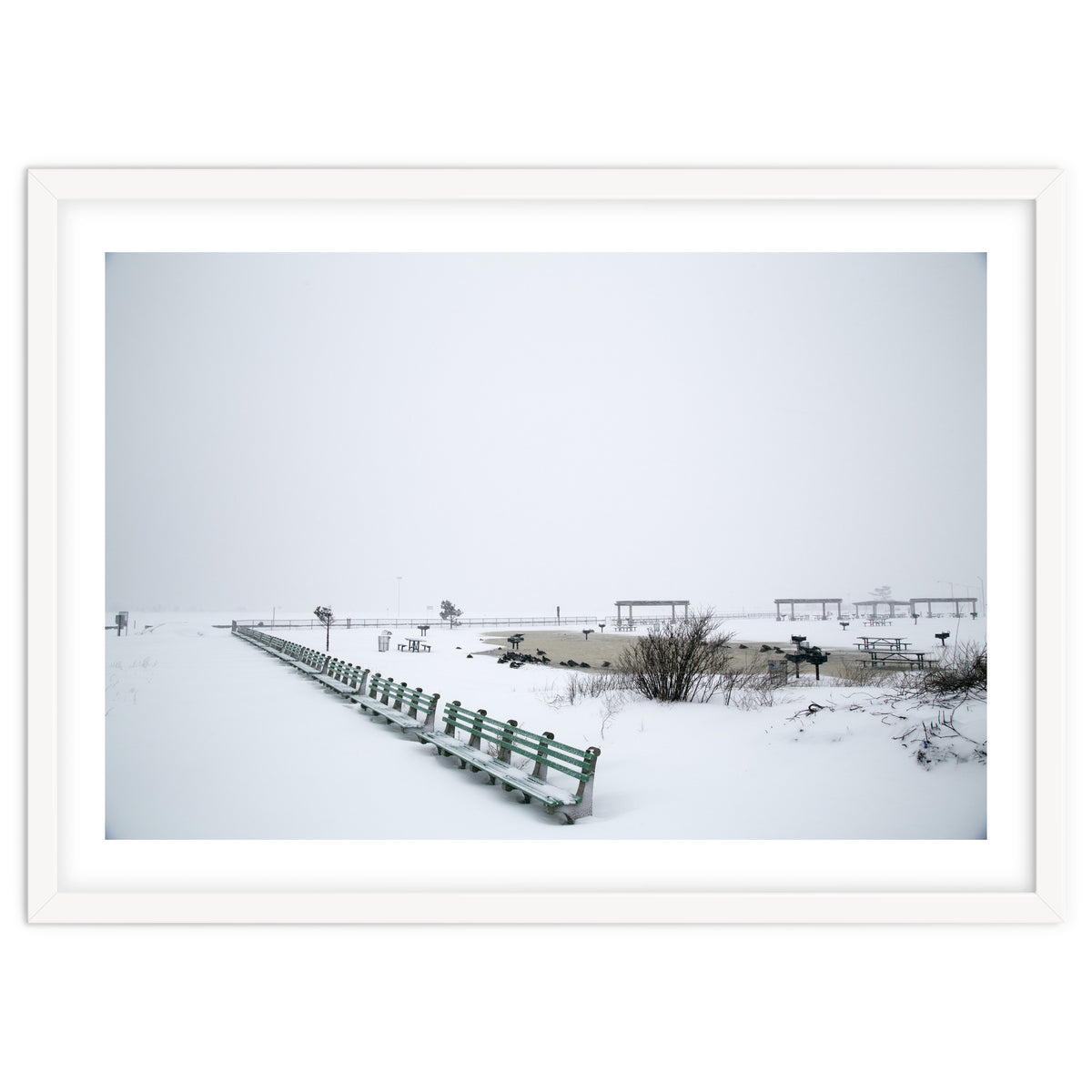 No people on a bench in the snowy winter