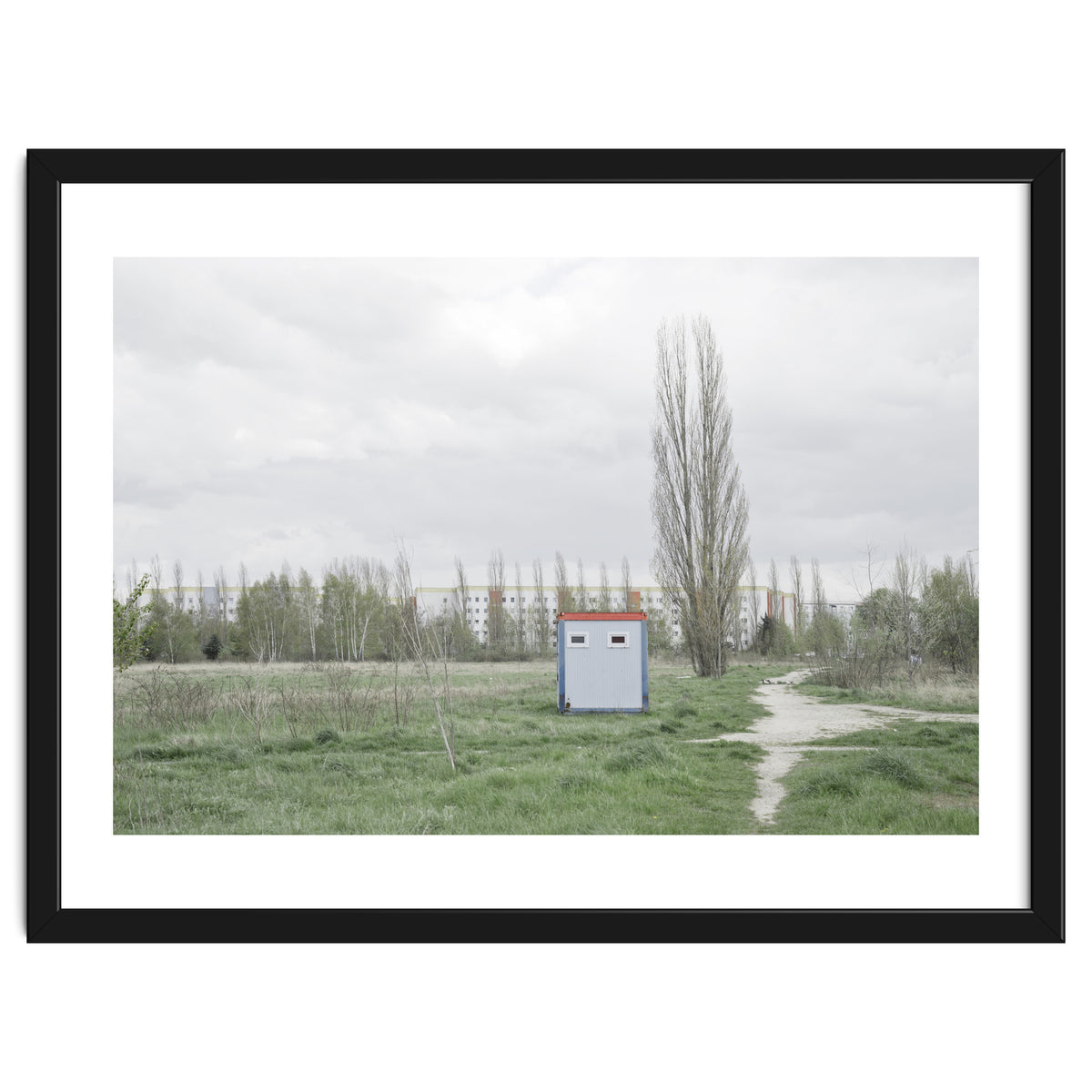 Hut in the middle of green field