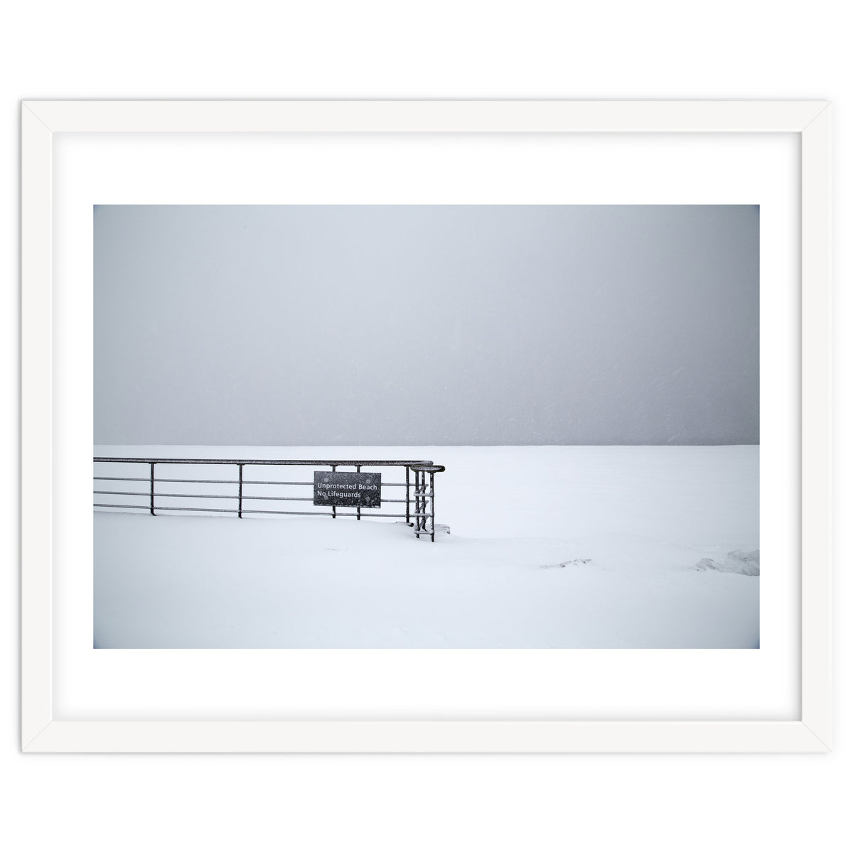 No lifeguards on the sign board in the winter snow beach