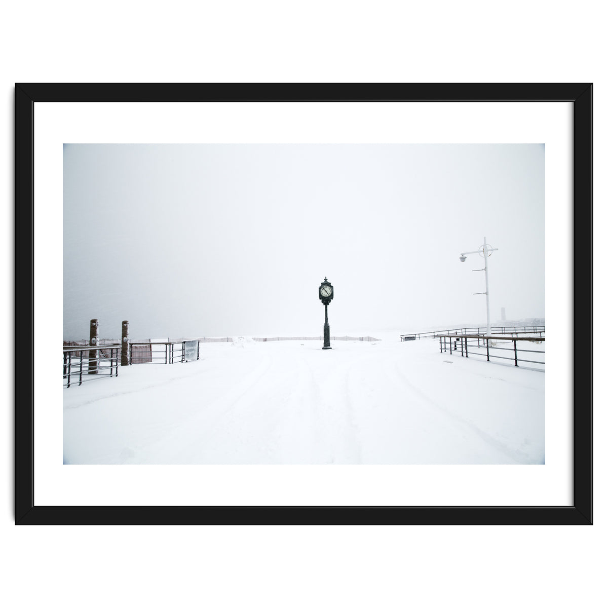 A clock tower in the snow beach
