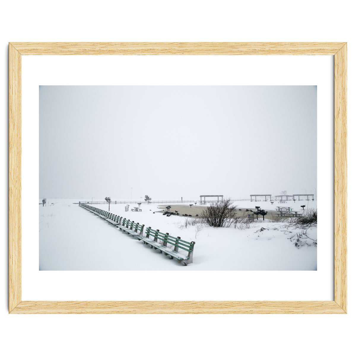 No people on a bench in the snowy winter
