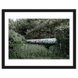Graffiti pipe among the summer forest thumbnail
