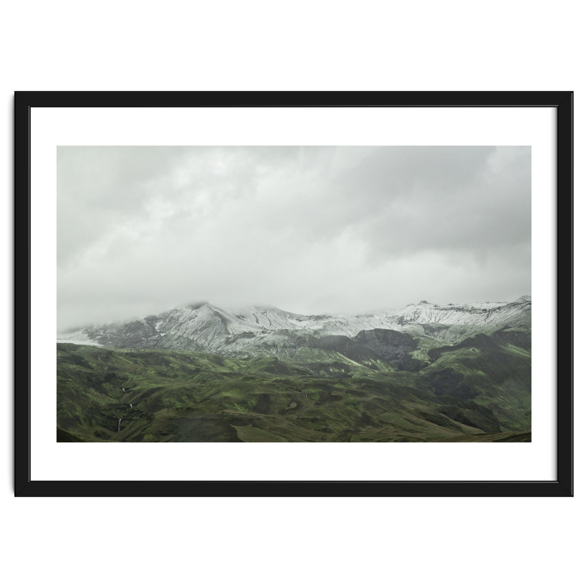 Snow-covered green mountains - Iceland