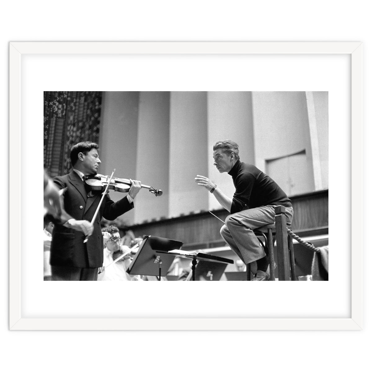 Conductor Herbert von Karajan rehearsing with Nathan Milstein in Lucerne, Switzerland. Lucerne,1957.