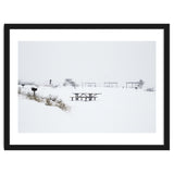 Tables and benches in a snow-covered park thumbnail
