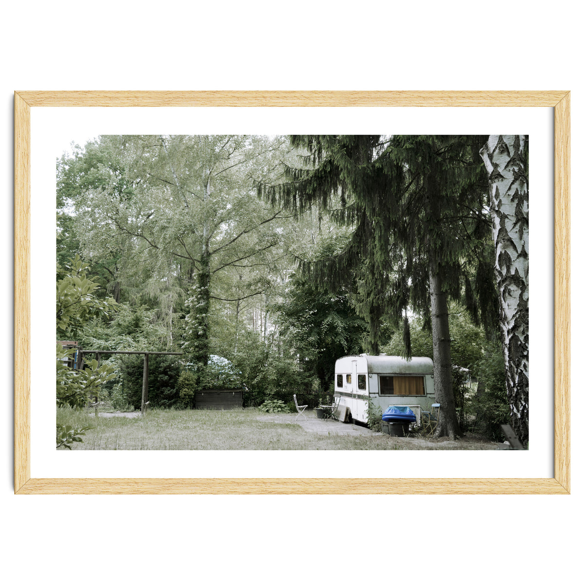 Travel trailer in the green garden