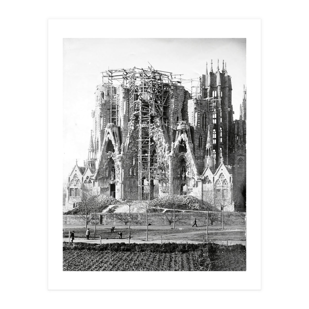 VIEW OF THE "SAGRADA FAMILIA" BASILICA BY ARCHITECT ANTONI GAUDI, PHOTOS OF WORK.  Ca. 1910. (Print Only)