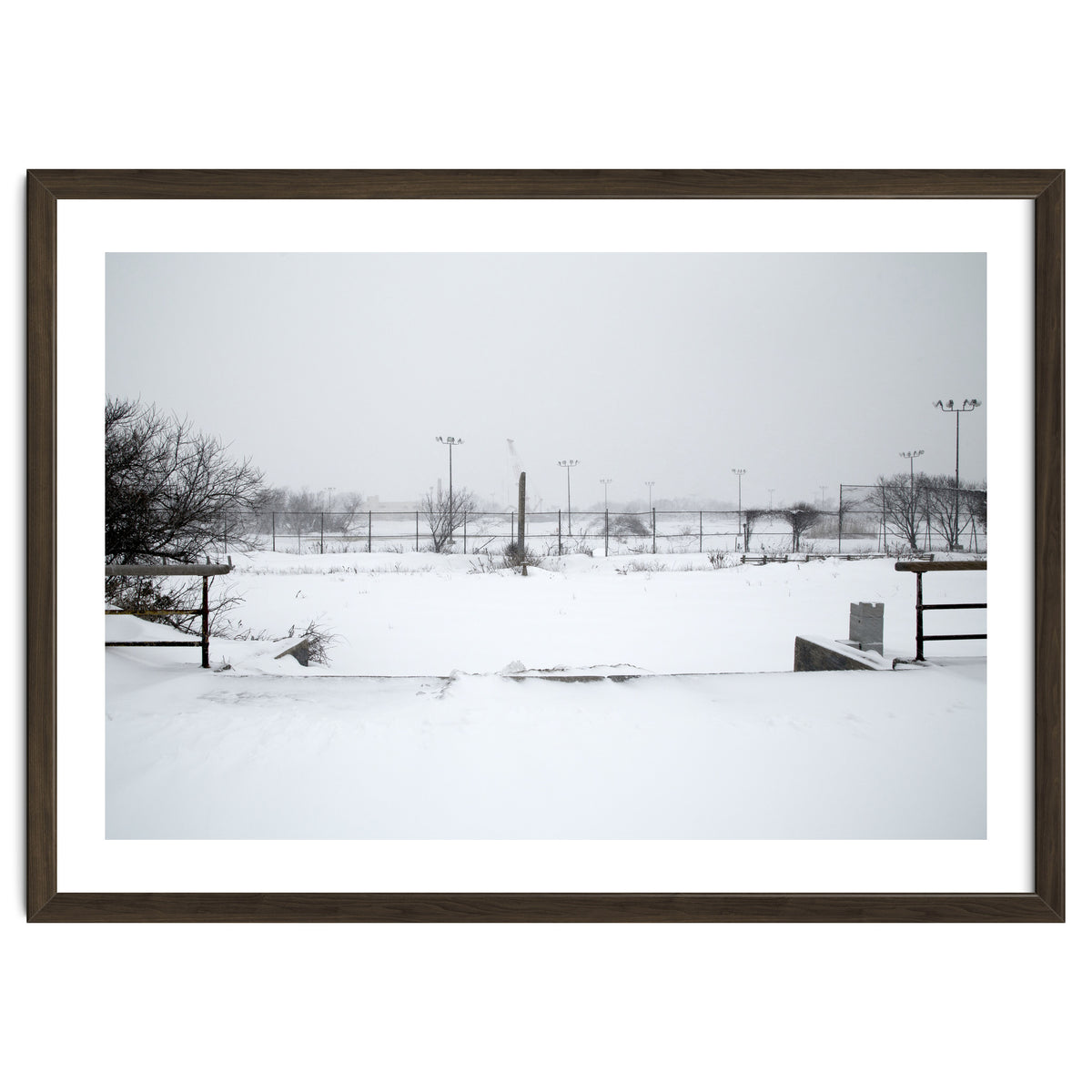 Baseball field covered in snow