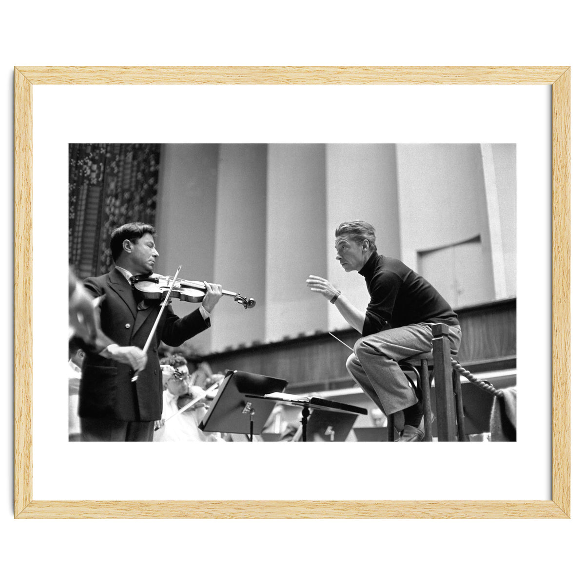 Conductor Herbert von Karajan rehearsing with Nathan Milstein in Lucerne, Switzerland. Lucerne,1957.