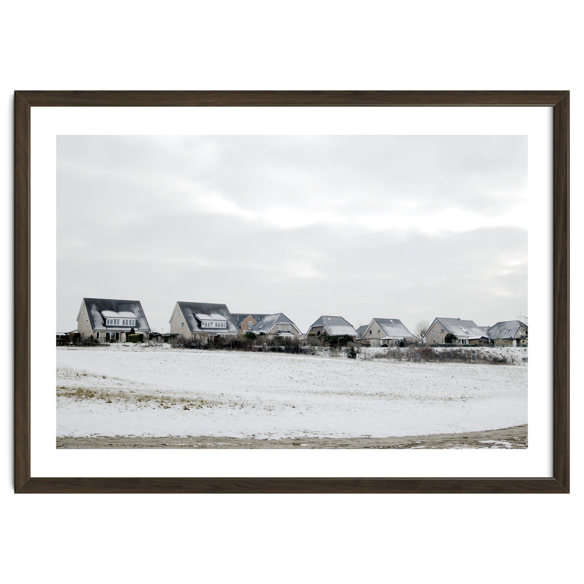 Snow covered houses on the hill