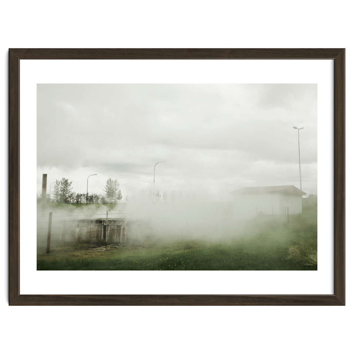 A source covered in steam from a hot spring - Iceland