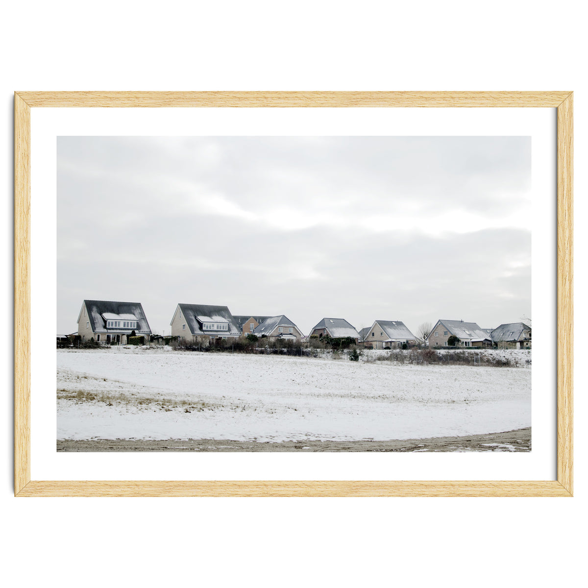 Snow covered houses on the hill