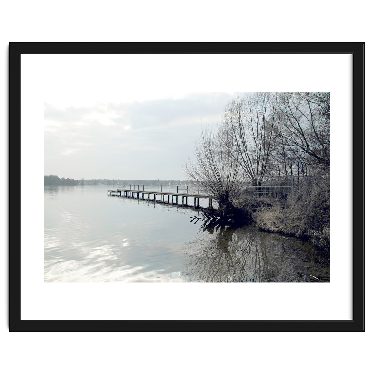 Sunny day pier in the lake