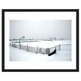 Snow-covered deserted basketball court in winter thumbnail