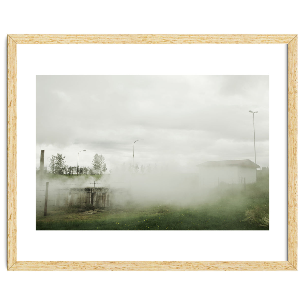 A source covered in steam from a hot spring - Iceland