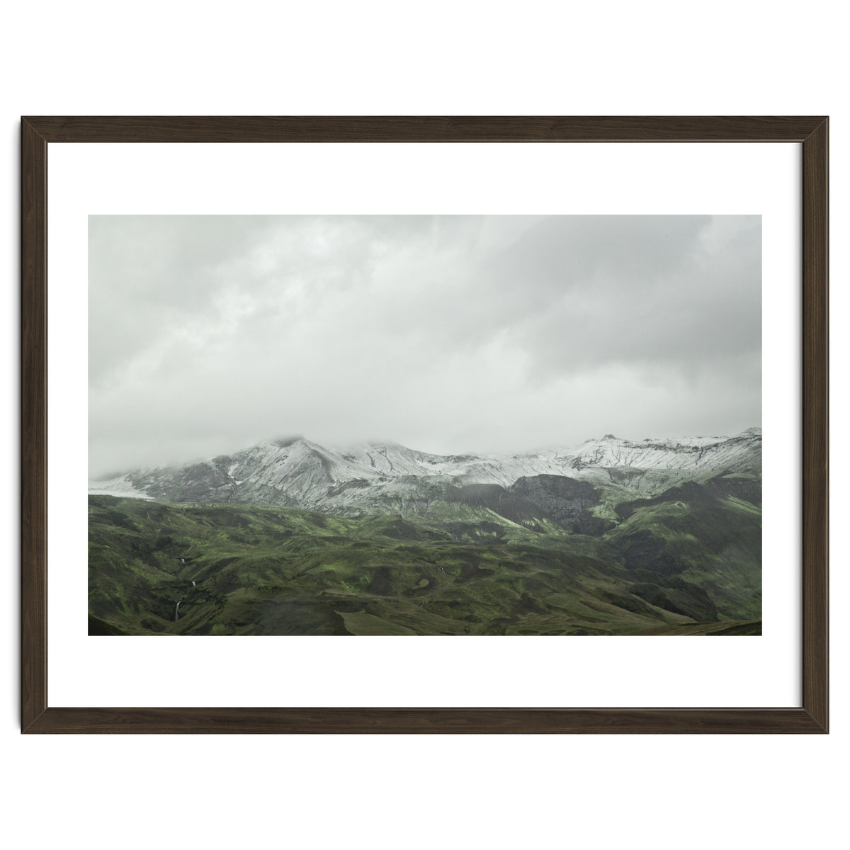 Snow-covered green mountains - Iceland
