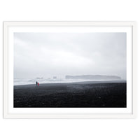 Family walking on the black sand beach - Iceland