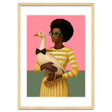Stylish Woman Holding Goose In Striped Dress thumbnail