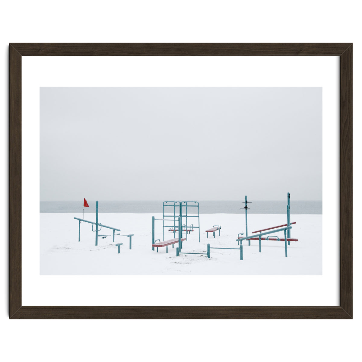 Playground in the winter snow beach