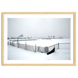 Snow-covered deserted basketball court in winter thumbnail