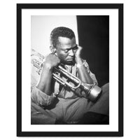 Jazz trumpeter Miles Davis early in his career playing in New York City, circa 1955.