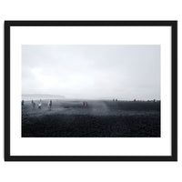 Tourists on the black sand beach - Iceland