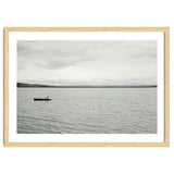 A boy pedaling the Board on the Lake - Iceland thumbnail