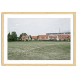 Red roof houses in the green field thumbnail