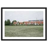 Red roof houses in the green field thumbnail