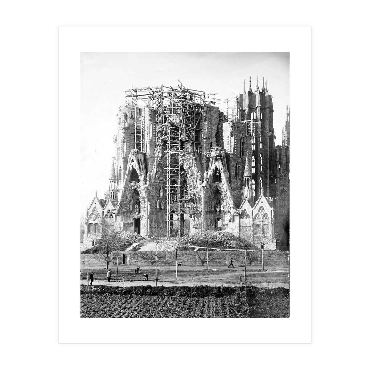 VIEW OF THE "SAGRADA FAMILIA" BASILICA BY ARCHITECT ANTONI GAUDI, PHOTOS OF WORK.  Ca. 1910. (Print Only)