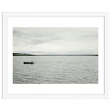 A boy pedaling the Board on the Lake - Iceland thumbnail