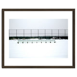 Bench with no people in snowy winter thumbnail