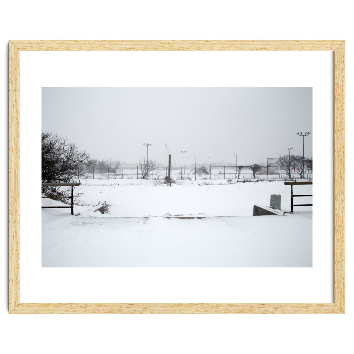 Baseball field covered in snow