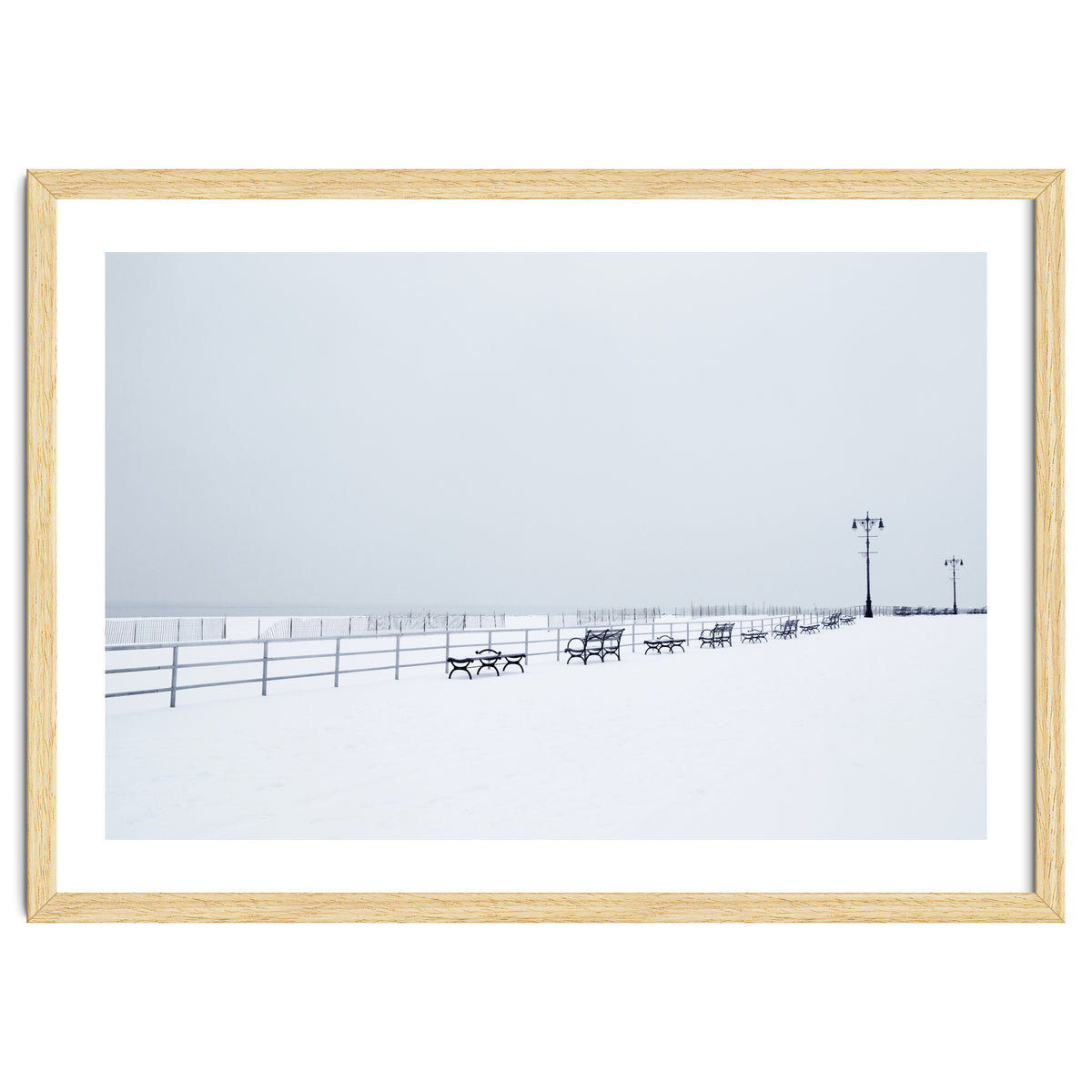 Benches along the pier on snow beach