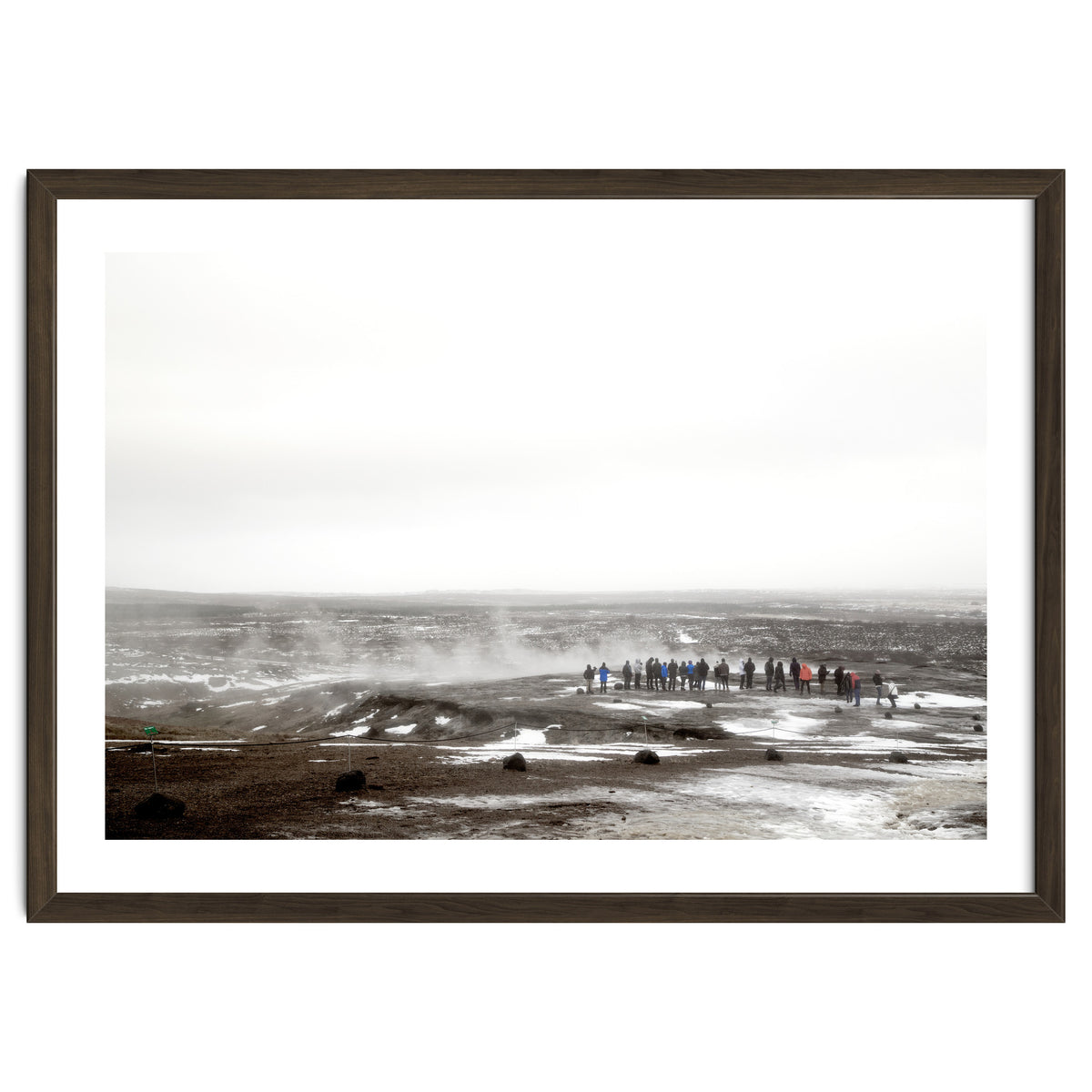Tourists looking at the geyser - Iceland