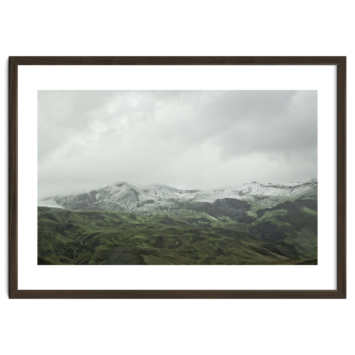 Snow-covered green mountains - Iceland
