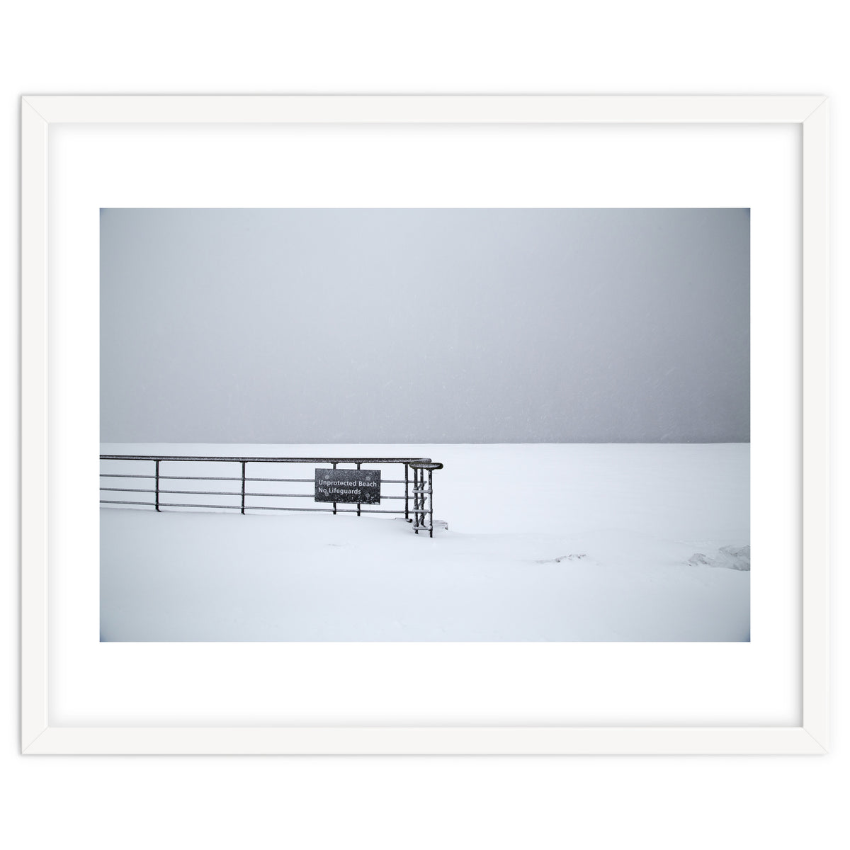 No lifeguards on the sign board in the winter snow beach