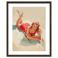 Pinup Girl Posing On A Beach