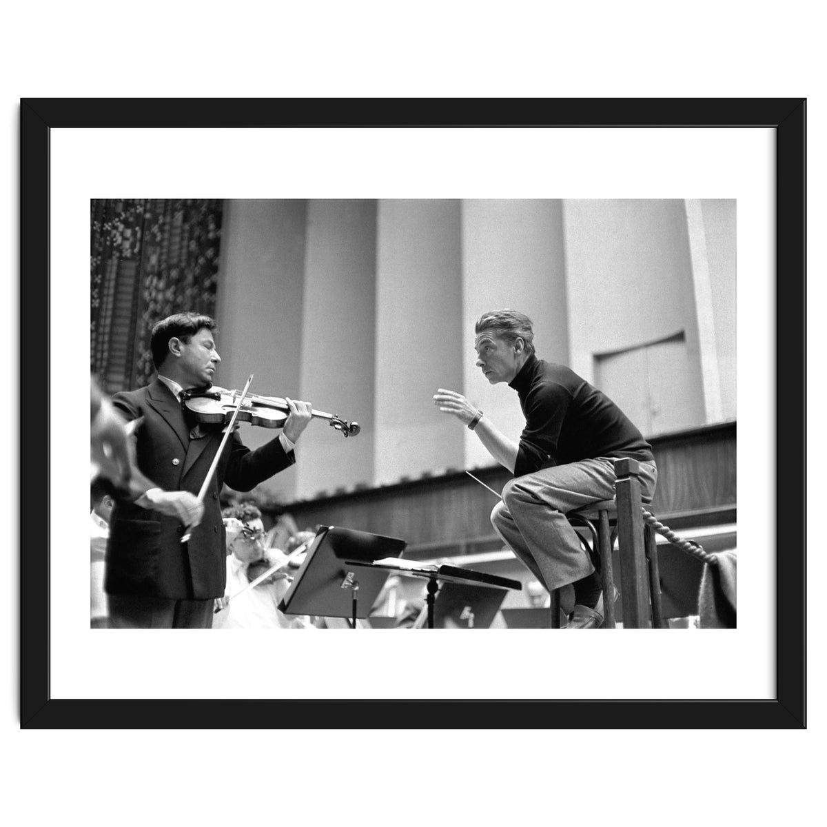 Conductor Herbert von Karajan rehearsing with Nathan Milstein in Lucerne, Switzerland. Lucerne,1957.