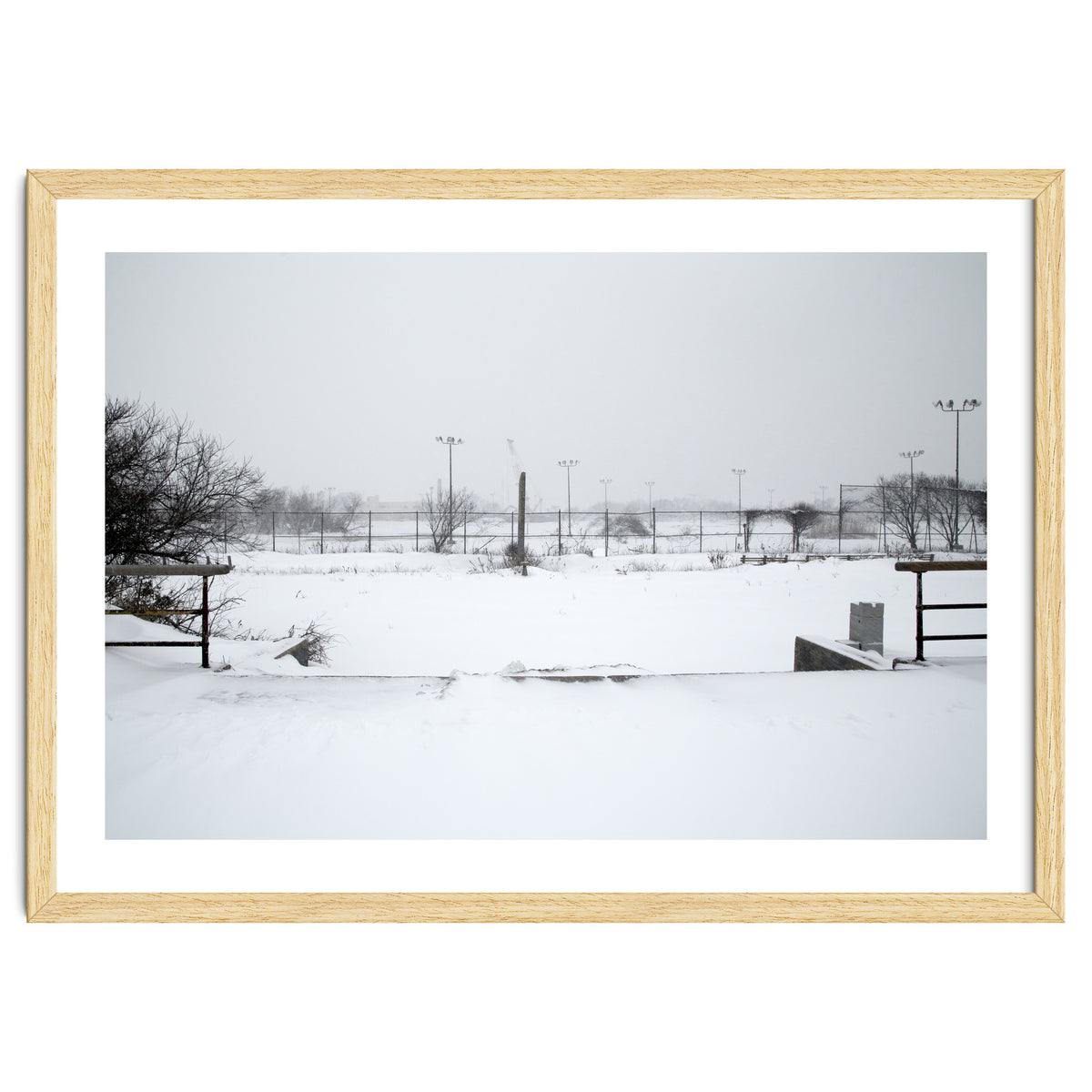 Baseball field covered in snow