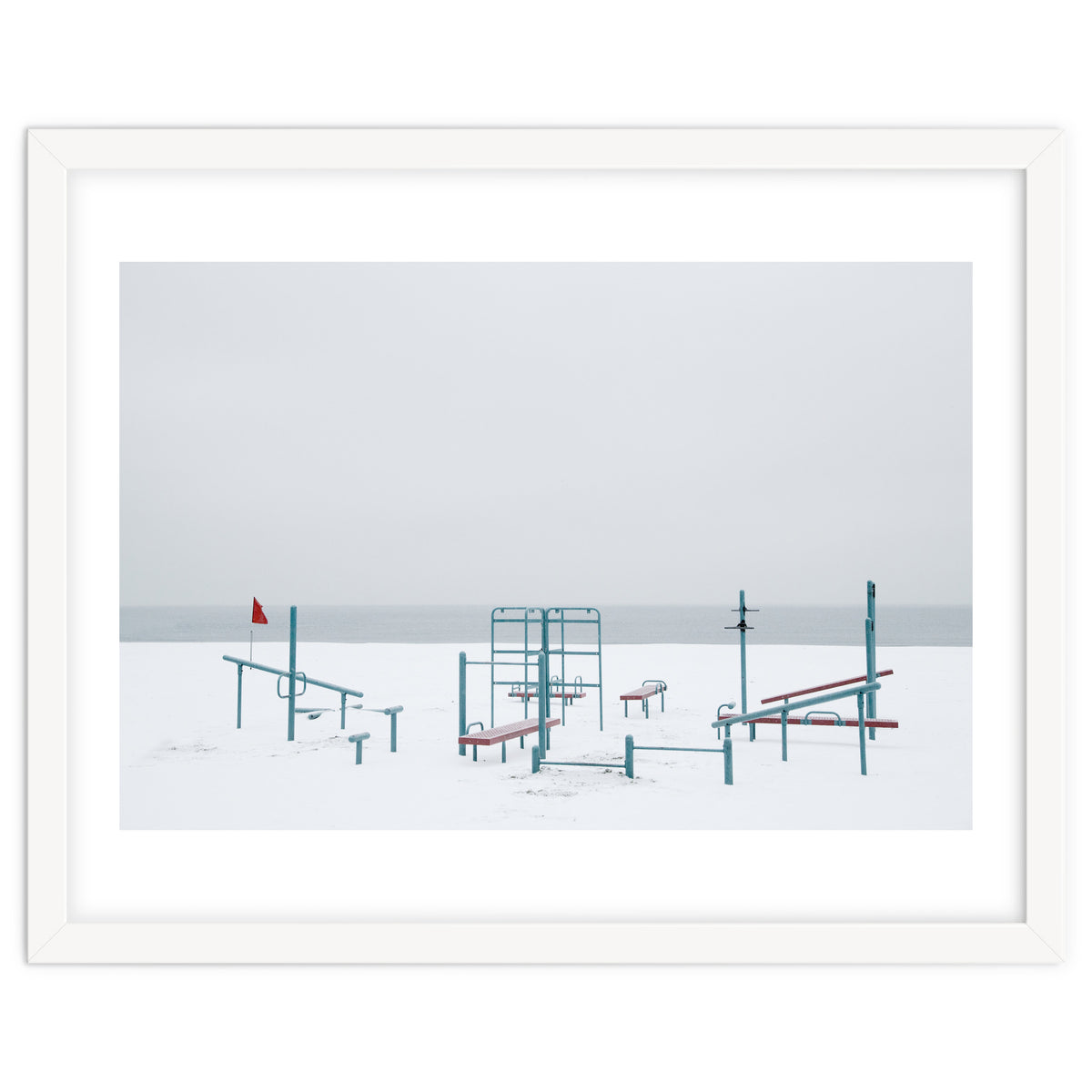 Playground in the winter snow beach