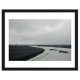 River passing through a black volcanic road - Iceland thumbnail