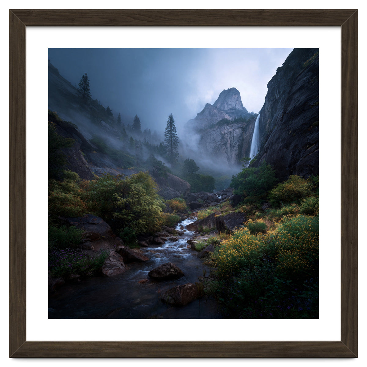 Majestic Misty Mountain Valley with Cascading Waterfall