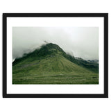 Green mountain covered in clouds - Iceland thumbnail