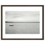 A boy pedaling the Board on the Lake - Iceland thumbnail