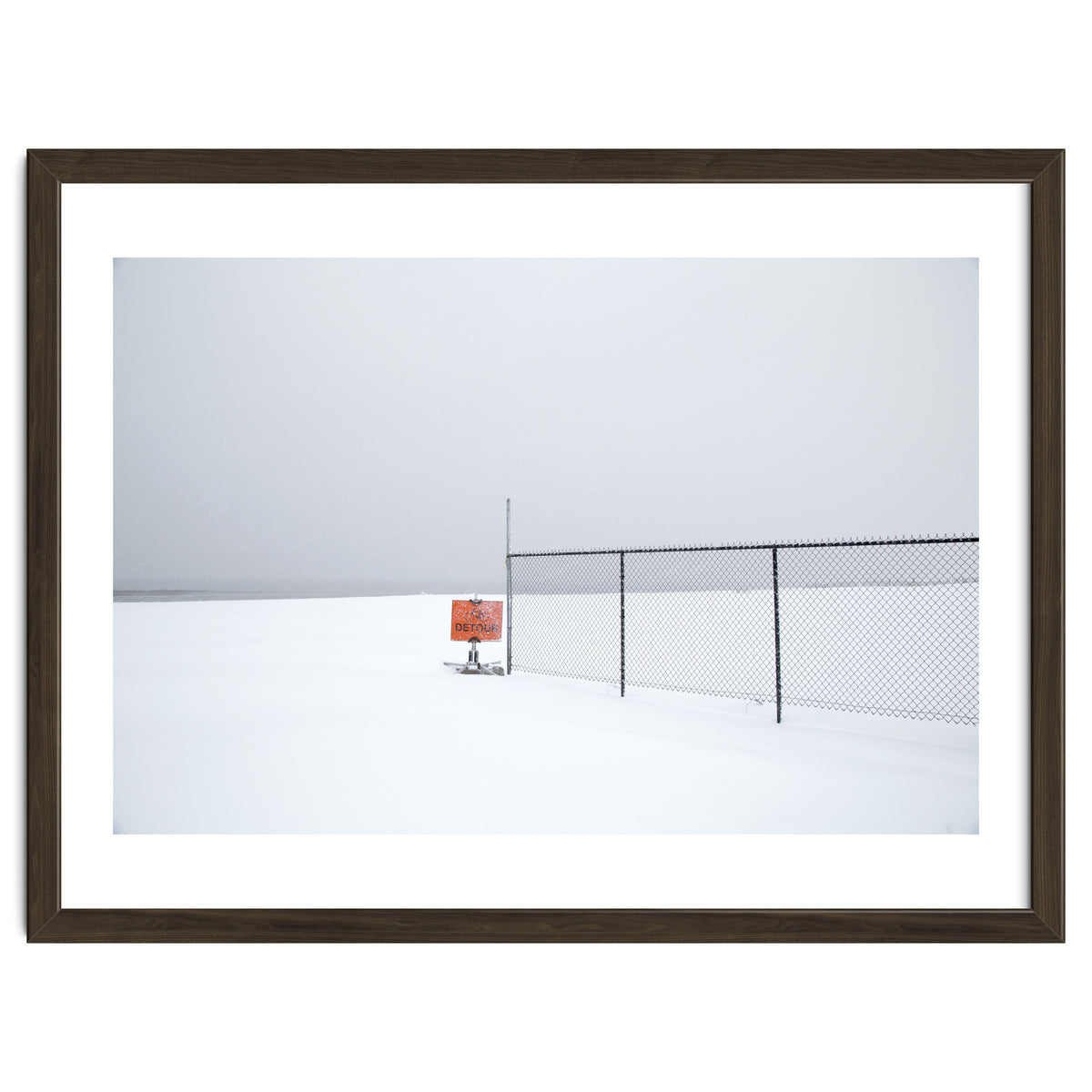 Detour sign in the snow beach