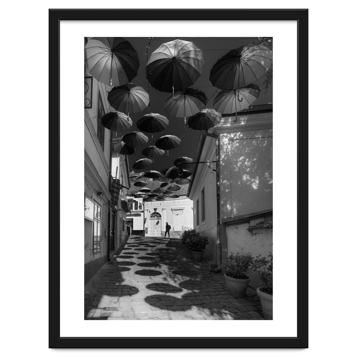 Under umbrellas