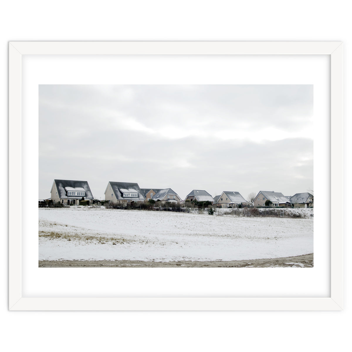 Snow covered houses on the hill