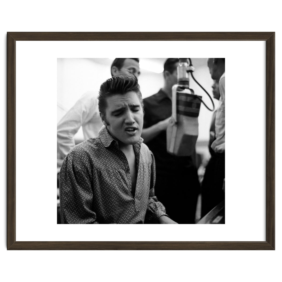 The American singer Elvis Presley during a recording session in 1956.